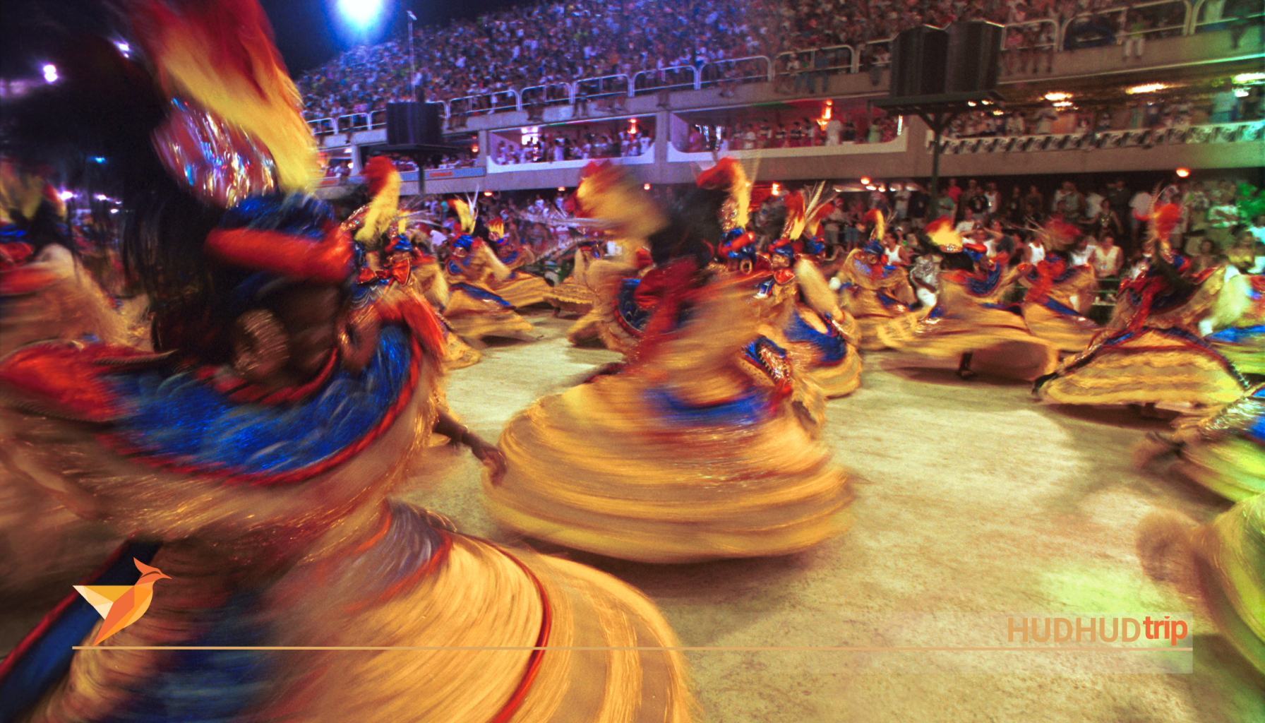 Colorful float with samba dancers performing at the Sambadrome during Rio Carnival