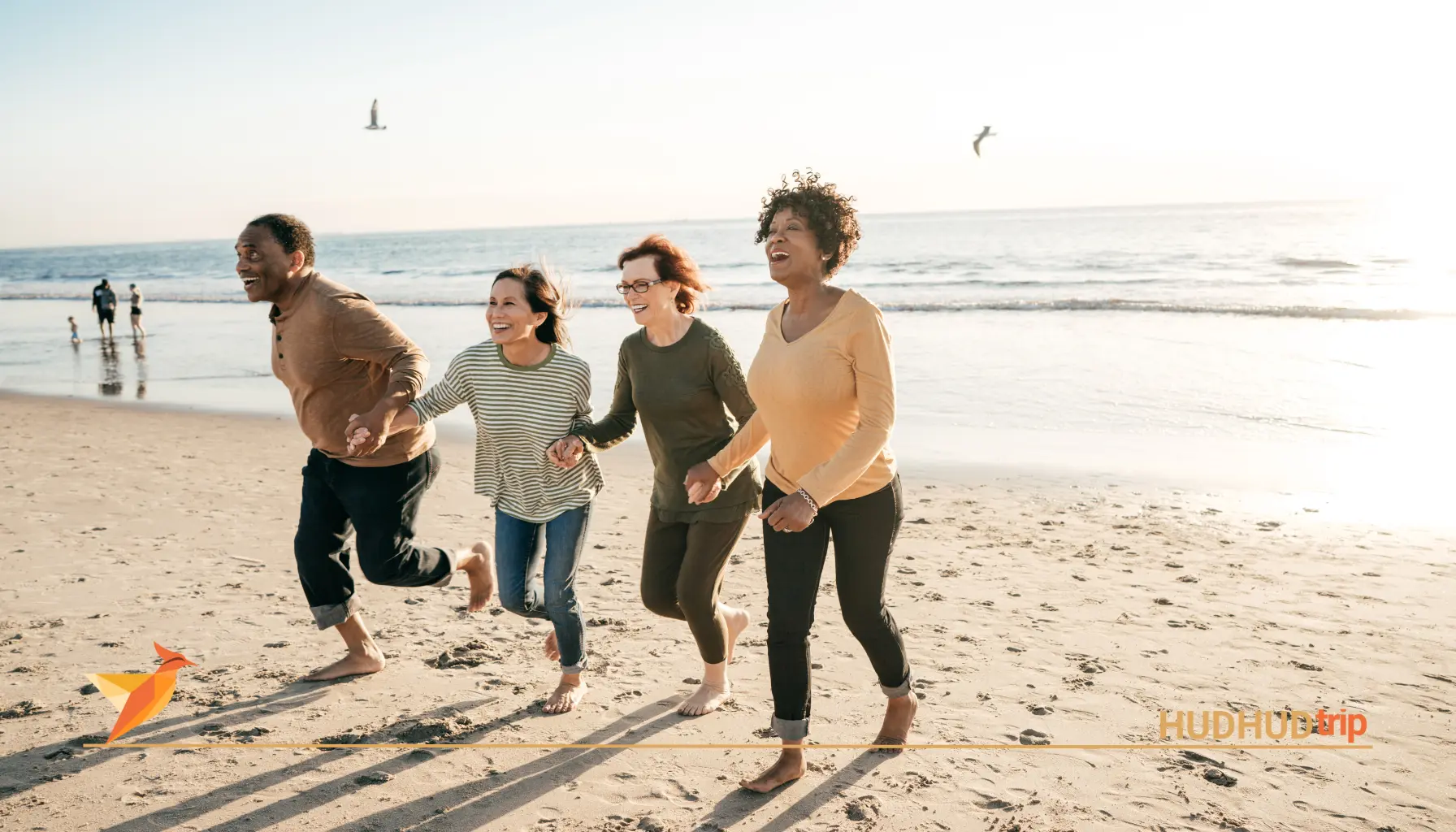 a group of friends laughing in beach