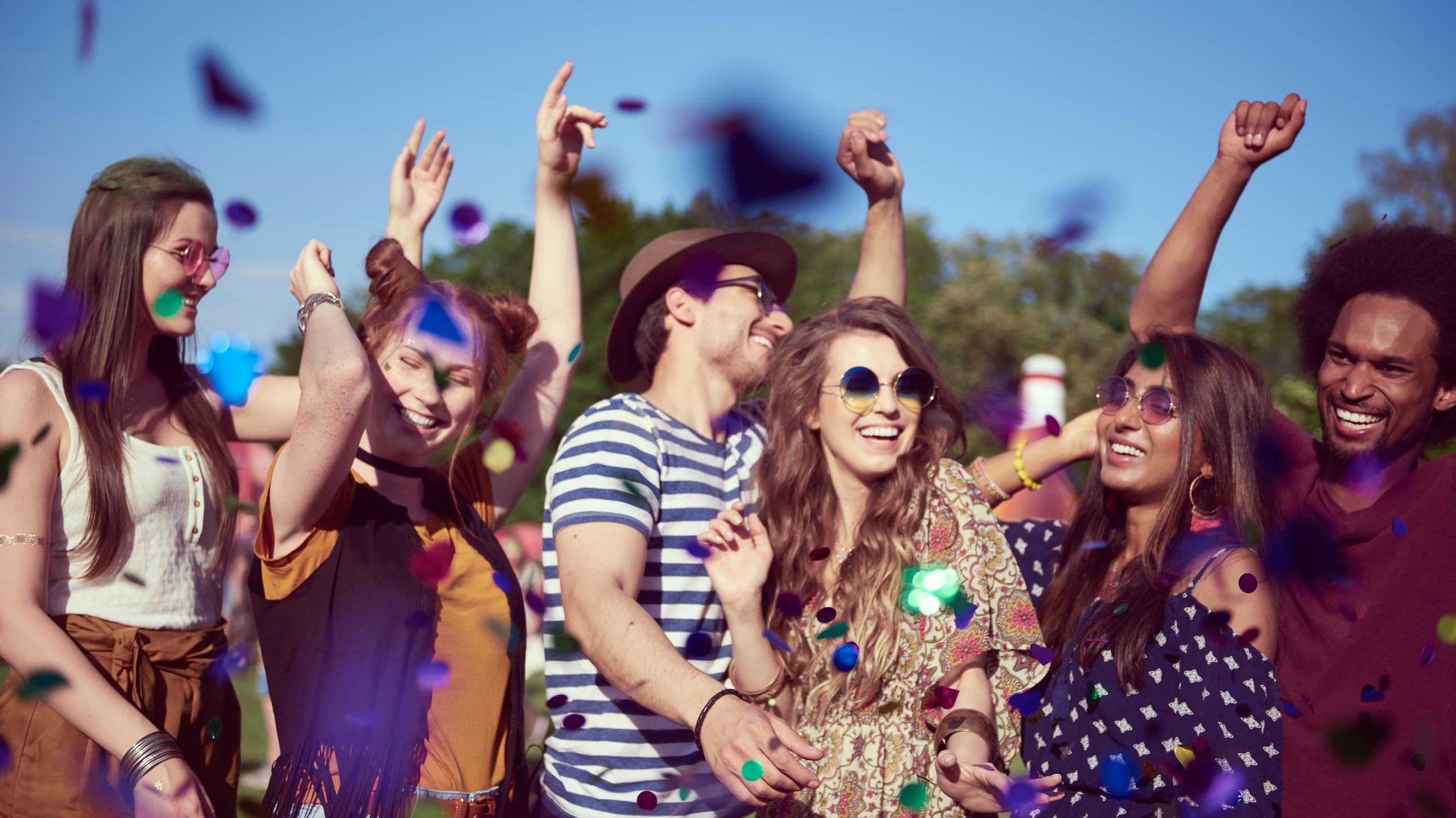 a group of happy people in a festival